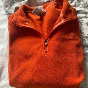 The North face Small quarter zip pull over. Soft and comfy, no rips no stains.